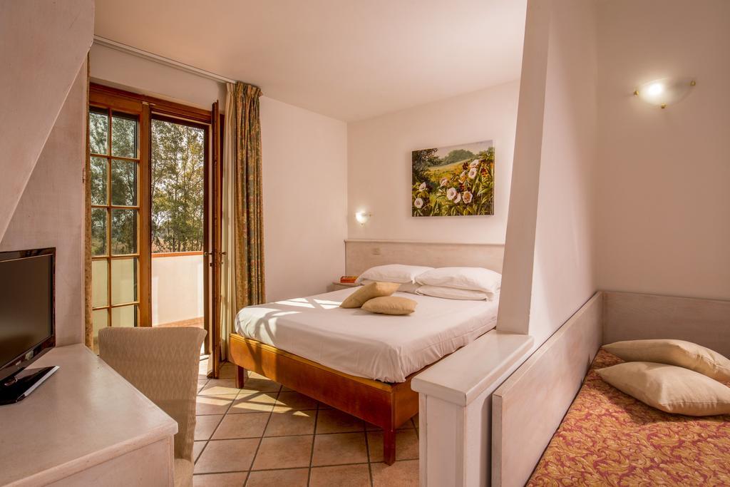 Tris Hotel Orbetello Cameră foto